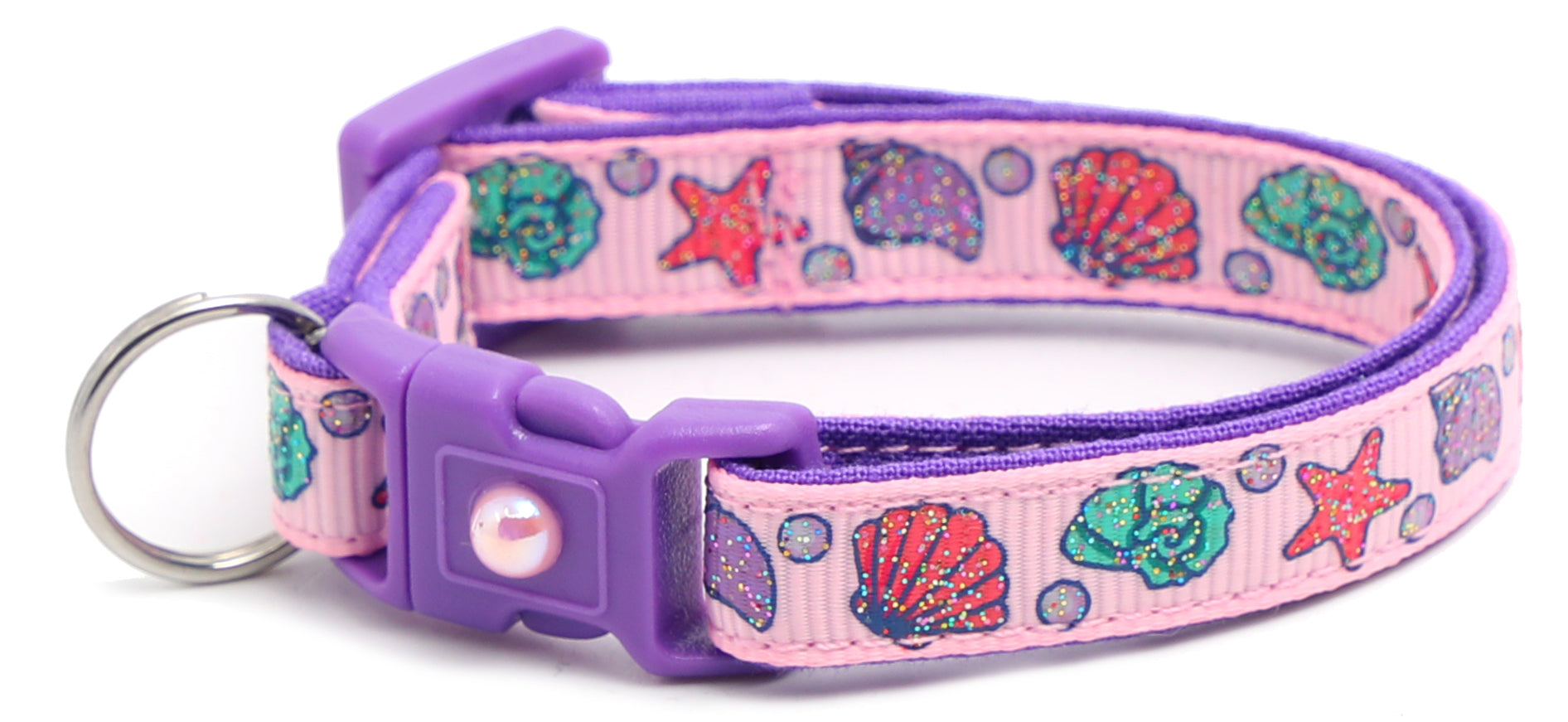Beachcomber Breakaway Cat Collar in vibrant colors, featuring a breakaway clip and removable bell, made from soft reinforced cotton.